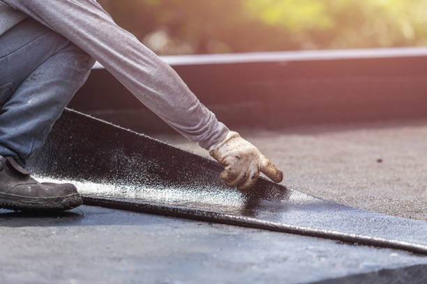 Professional Basement Waterproofing technician working in Bethel, OH